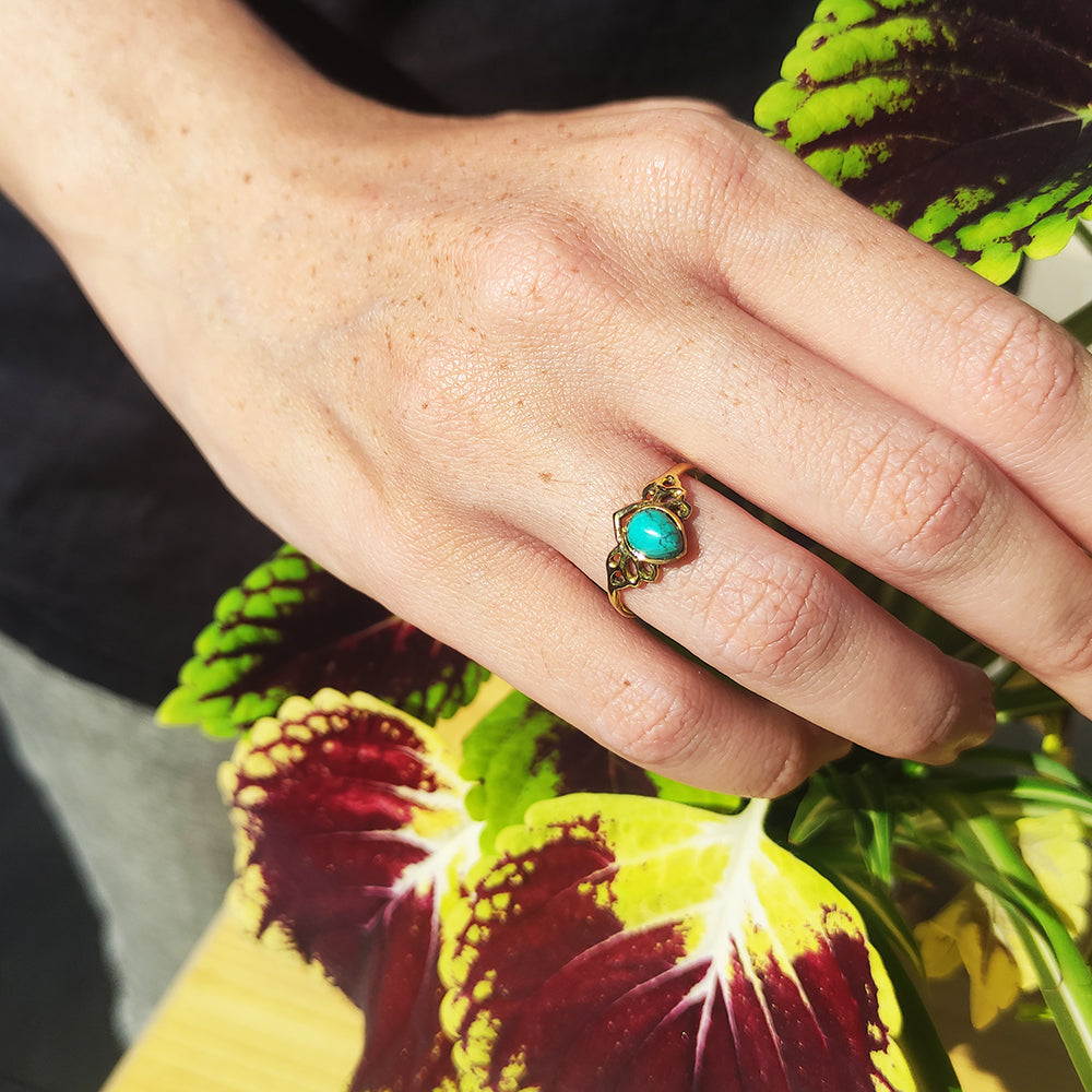 Anillo Alado con Piedra Turquesa