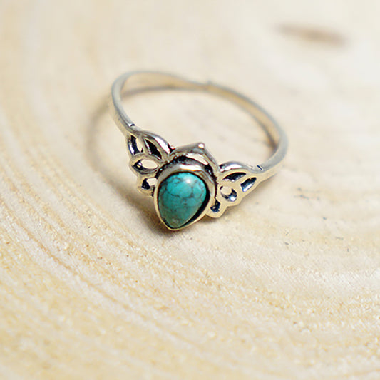 Anillo Alado con Piedra Turquesa