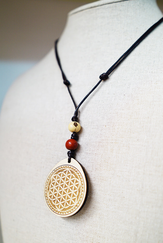 Colgante Flor de la Vida Bolitas Madera Arce Trinity