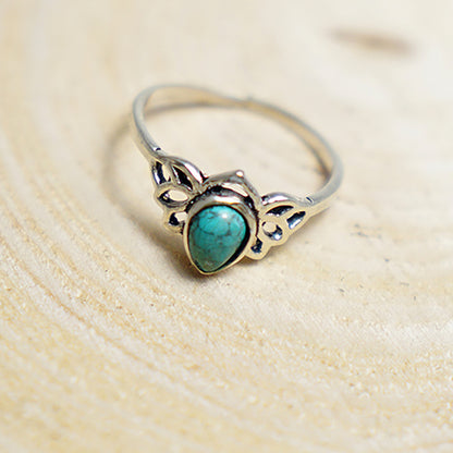 Anillo Alado con Piedra Turquesa