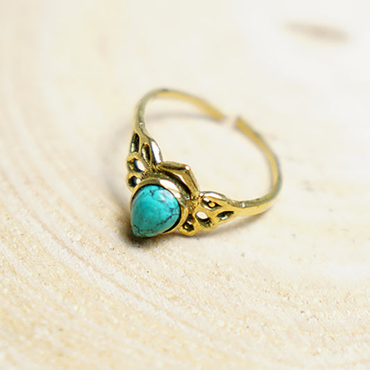 Anillo Alado con Piedra Turquesa